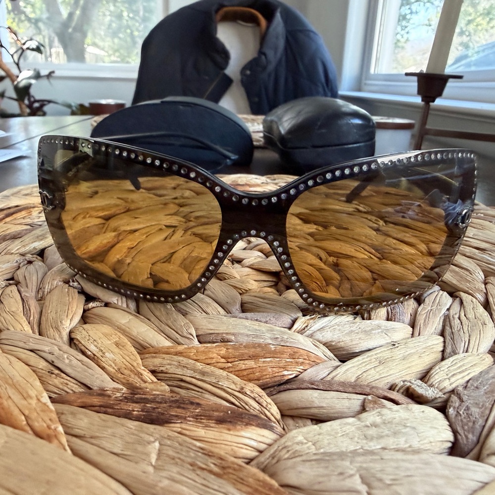 CHANEL Black Frame Sunglasses with Amber Lenses and Crystal Accents